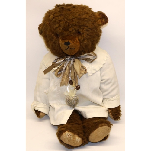 58 - Mid C20th large brown straw filled teddy bear, 62cm