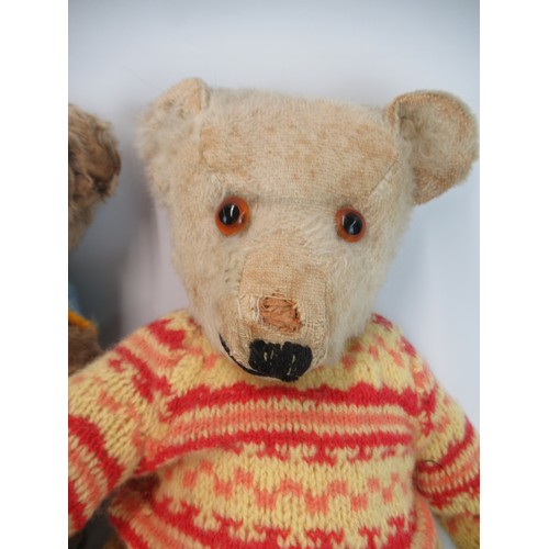 53 - Three early C20th British teddy bears in knitted outfits