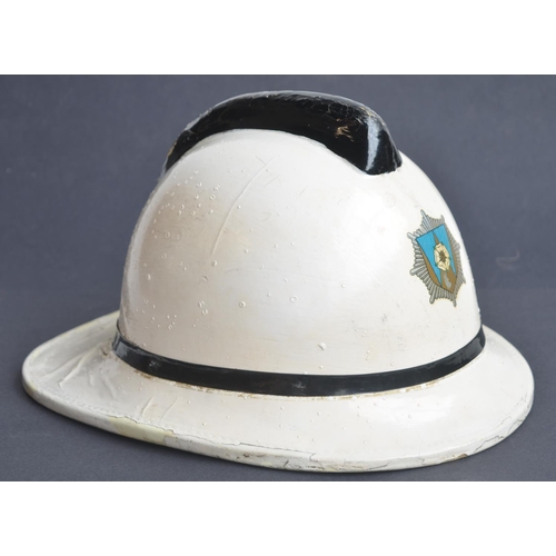 74 - Vintage Yorkshire fire fighters helmet (size medium, 57-59 and dated 1985) and a heavy duty fire hos... 