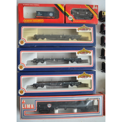 82 - Collection of previously used OO/HO gauge rolling stock and passenger wagons to include 2 Lima Fina ... 