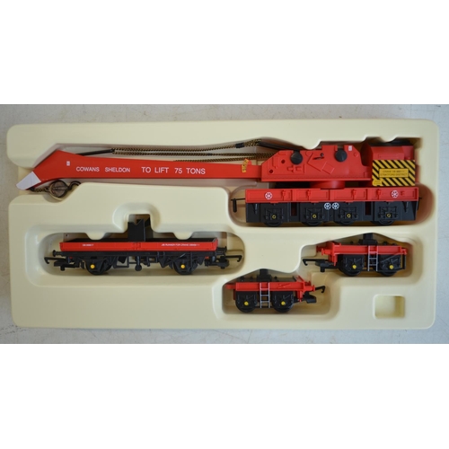 84 - Collection of little used OO gauge Hornby, Lima and Airfix railway coaches, wagons, a 75 Ton Operati... 