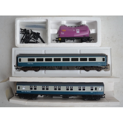 84 - Collection of little used OO gauge Hornby, Lima and Airfix railway coaches, wagons, a 75 Ton Operati... 