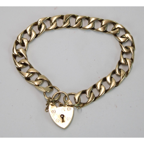 1441 - Hallmarked 9ct gold curb link bracelet with 9ct gold heart shape padlock clasp and safety chain, 31g