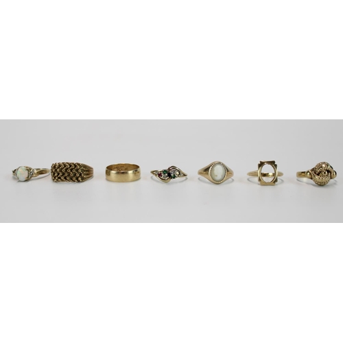 Selection of hallmarked 9ct gold rings incl. Keeper ring, wedding band, white opal ring etc. gross 21g (some stones missing)