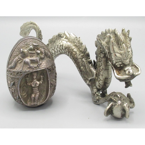 647 - C20th Cypriot/Greek white metal decorative egg ornament, decorated in relief with mythical scenes an... 