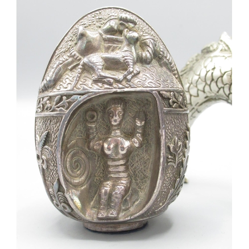 647 - C20th Cypriot/Greek white metal decorative egg ornament, decorated in relief with mythical scenes an... 