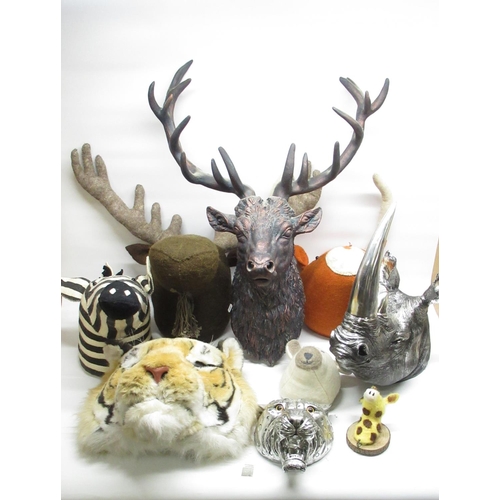 651 - Mixed collection of soft toy and composite material animal heads inc. Rhino, Tiger, Moose, Stag, etc... 