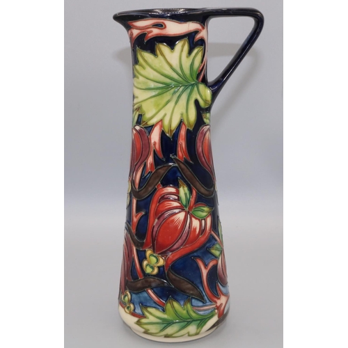 1385 - Moorcroft Pottery: Red Ribbons design jug designed by Shirley Hayes, tubelined decoration of red and... 