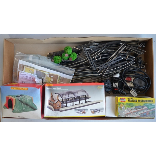 85 - Collection of OO gauge railway accessories, track, power controllers, buildings etc. 2 boxes