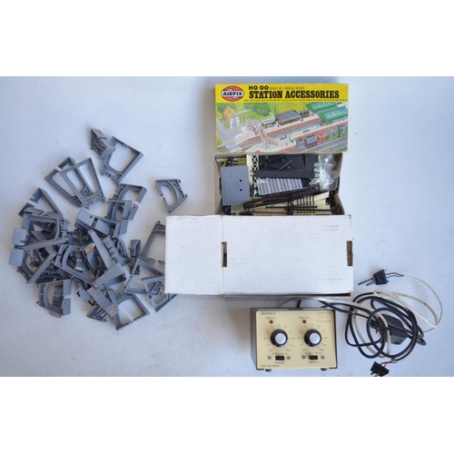 85 - Collection of OO gauge railway accessories, track, power controllers, buildings etc. 2 boxes