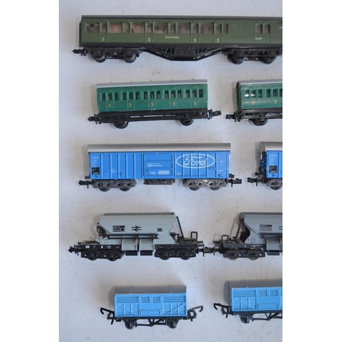 91 - Collection of N gauge passenger and goods wagons to include Peco, Lone-Star and Trix. Please note wa... 