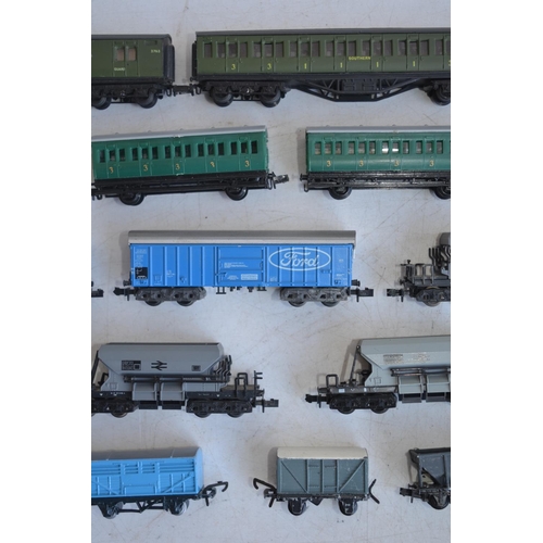 91 - Collection of N gauge passenger and goods wagons to include Peco, Lone-Star and Trix. Please note wa... 