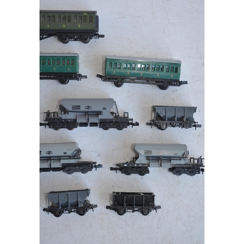 91 - Collection of N gauge passenger and goods wagons to include Peco, Lone-Star and Trix. Please note wa... 