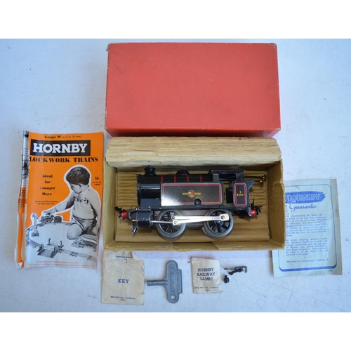 96 - Collection of vintage Hornby Meccano tinplate O gauge railway models to include a boxed clockwork Re... 