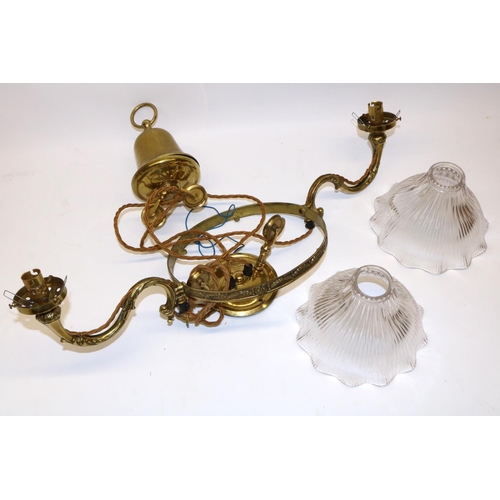 1395 - Brass rise and fall two branch ceiling light fitting, with two fluted pressed glass shades