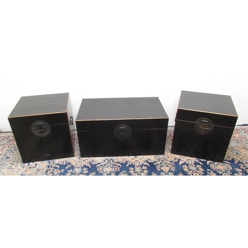 673 - Chinese black lacquer rectangular box, and two similar square boxes, all with metal carry handles an... 