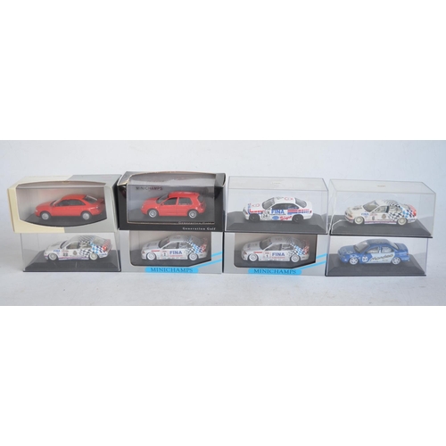 81 - Eight 1/43 scale diecast car models by Minichamps to include touring cars, a Generation VW Golf and ... 