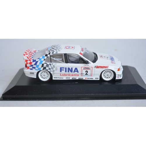 81 - Eight 1/43 scale diecast car models by Minichamps to include touring cars, a Generation VW Golf and ... 