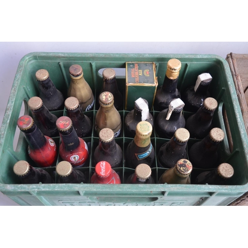 87 - Plastic Bulmers beer crate filled with unopened bottled beers and soft drinks (Budweiser 2006 World ... 