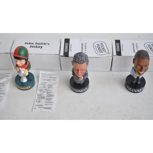 88 - 3x Guinness Pocket Pundit and 4 John Smith's speaking figurine caricatures, all boxed. (7)