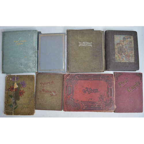 102 - Eight vintage postcard and photo albums containing a large number of photographs including signed ex... 