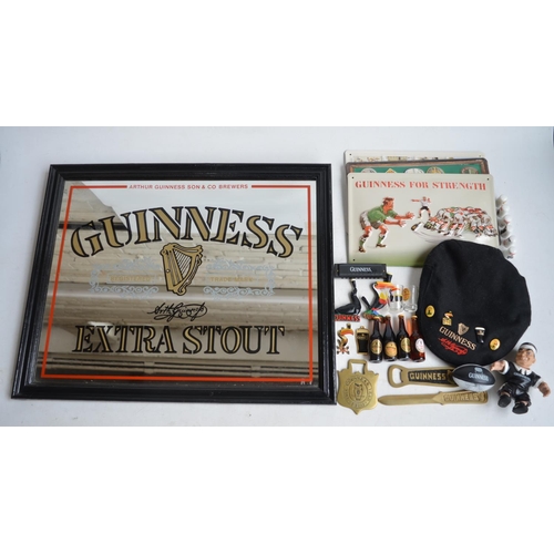 99 - Collection of Guinness related ephemera to include an Extra Stout mirror (58.3x48cm), a harmonica, b... 