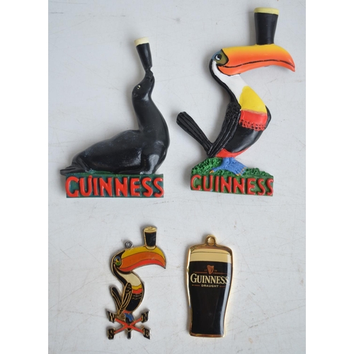 99 - Collection of Guinness related ephemera to include an Extra Stout mirror (58.3x48cm), a harmonica, b... 