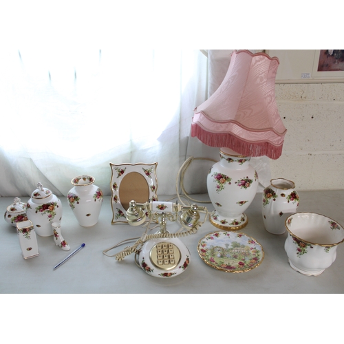 1400B - Royal Albert Old Country Roses decorative china incl. vases, clock, easel back photo frame etc. (12)