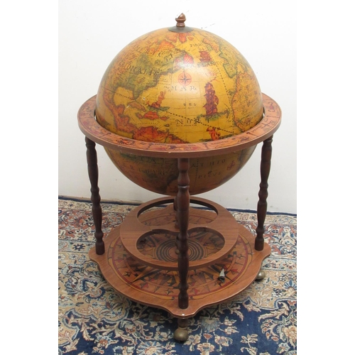 887 - Late C20th retro drinks Globe trolley with lift up top opening to reveal fitted interior on turned s... 