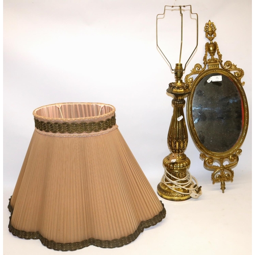 694 - C20th gilt Rocco style table lamp H83cm and a C20th Neo Classical brass framed oval mirror H69cm (2)... 