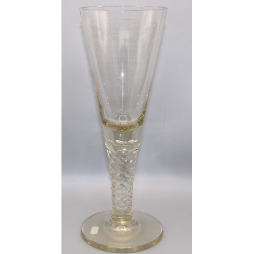 697 - Early to mid C20th continental glass vase in the form of an C18th cordial glass, controlled bubble m... 