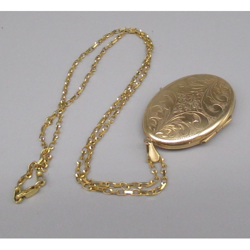 1316 - 9ct yellow gold pendant locket with engraved floral detail, on 9ct yellow gold chain, stamped 9kt, L... 