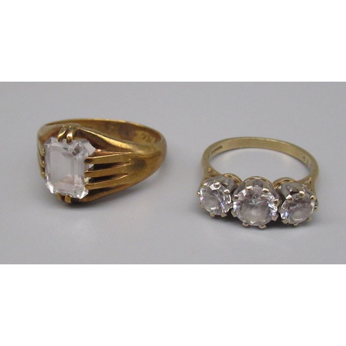 849 - 9ct yellow gold three stone ring set with clear stones, size N, and another 9ct gold ring set with a... 