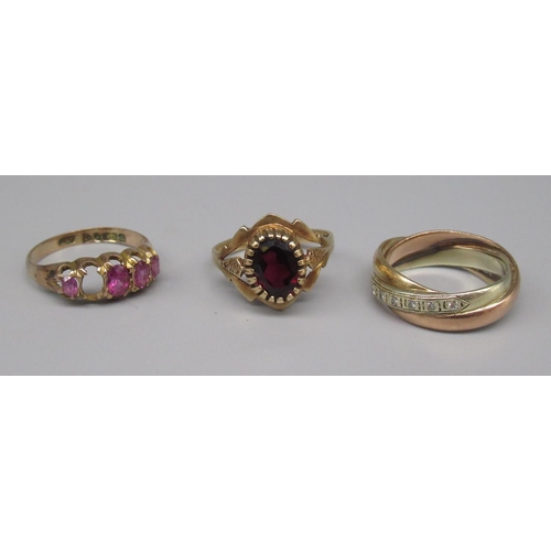 850 - 9ct yellow gold ring set with red stone, size M1/2, a 9ct gold ring set with purple stones, one miss... 