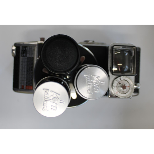 168 - Paillard Bollex D8L reflex film camera with triple lens and leather case, Miller model S 8mm cinecam... 