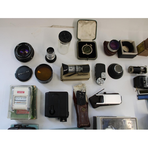 172 - Selection of miniature cameras and selection of camera lenses, accessories, filters, light meters, r... 