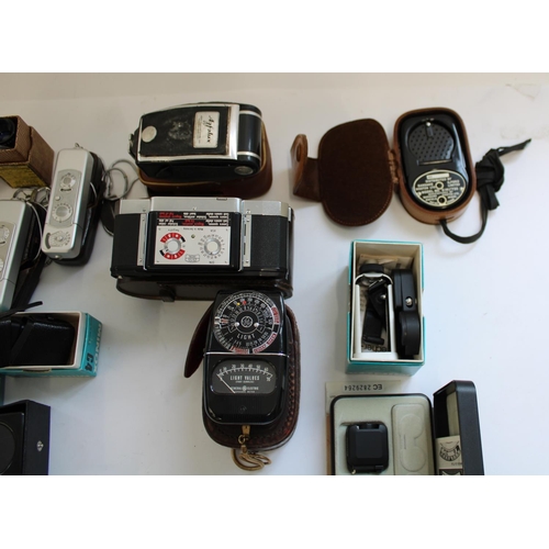 172 - Selection of miniature cameras and selection of camera lenses, accessories, filters, light meters, r... 