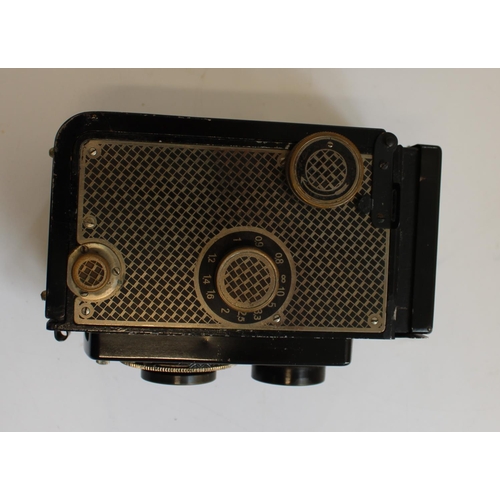 173 - c1930s Rolleicord wallpapered TLR camera in leather case