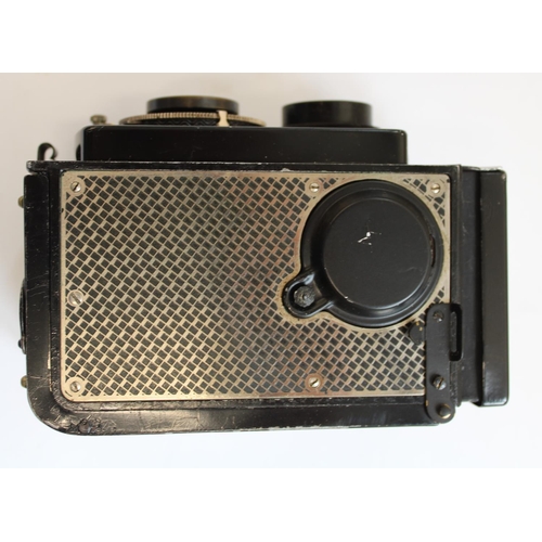 173 - c1930s Rolleicord wallpapered TLR camera in leather case