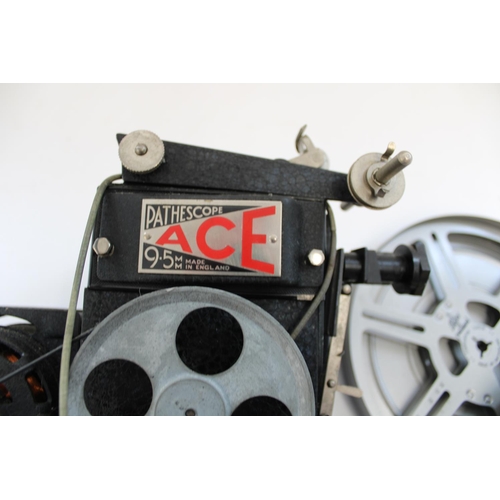 176 - Pathescope Ace 9.5mm projector with motor, Campro cinecamera projector and two spare spools