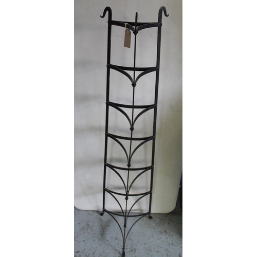 231 - Vintage seven tier painted wrought metal tapering pan stand, H137cm