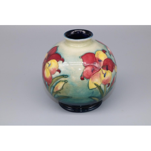 1214 - Moorcroft Pottery: African Lily pattern globular vase, tubelined decoration of pink and yellow flowe... 