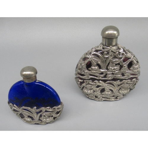 201 - Amethyst glass oval scent bottle, white metal overlaid with dragonflies and scrolls, and a similar s... 