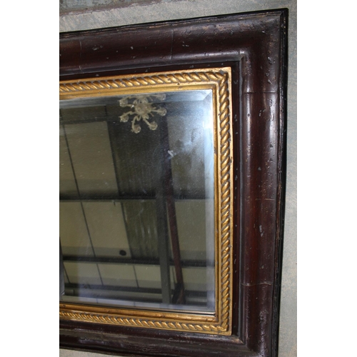 257 - Rustic style wall mirror, rectangular bevelled plate in gilt rope moulded and red frame, 93cm x 108c... 