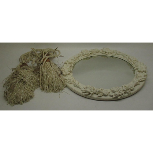 621 - Oval wall mirror in cream flower garland frame and set of four curtail tie backs (5)