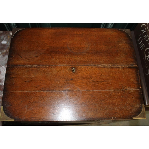 261 - C20th brass bound mahogany Campaign style writing desk, with folding leather lined top above drawers... 