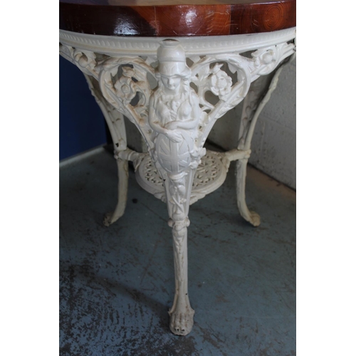 273 - Conservatory table, circular pine top on three Britannia cast metal supports with undertier, D60cm H... 