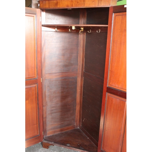 291 - A. Fraser & Co. Inverness mahogany corner wardrobe, twin panel doors with Greek Key band on bracket ... 