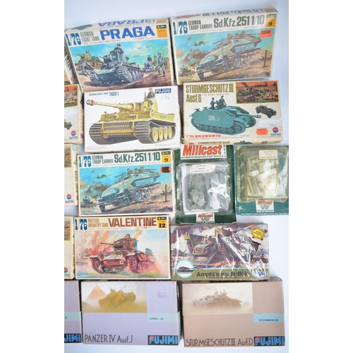 127 - Thirty one unbuilt 1/76 scale (OO gauge) armour model kits, mostly Fujimi and Nitto. Also included 2... 