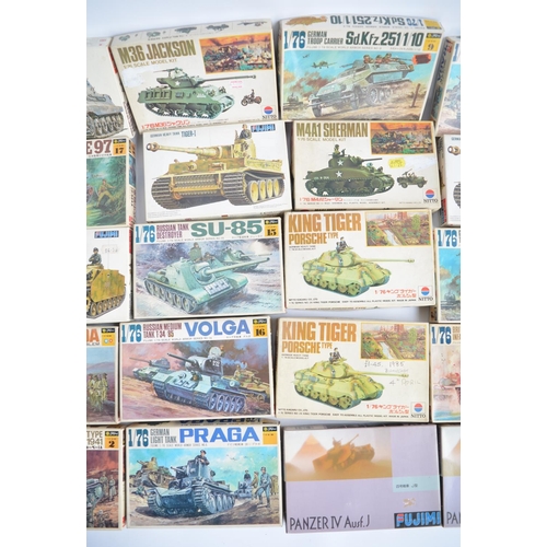 127 - Thirty one unbuilt 1/76 scale (OO gauge) armour model kits, mostly Fujimi and Nitto. Also included 2... 